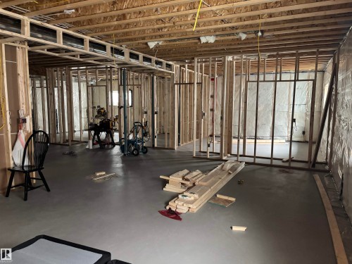 The property features an unfinished basement with exposed wooden framing for walls and ceilings, offering a blank canvas for customization - 137 Graybriar Drive, Stony Plain, AB - Indoor Photo Showing Basement