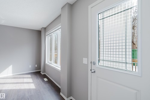 Back door leading to the backyard, backing onto trees. - 14007 164 Avenue, Edmonton, AB - Indoor Photo Showing Other Room