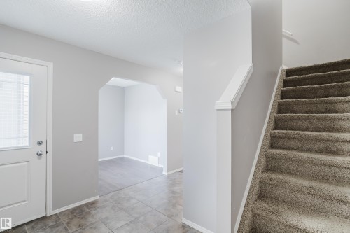 View from the garage entry - 14007 164 Avenue, Edmonton, AB - Indoor Photo Showing Other Room