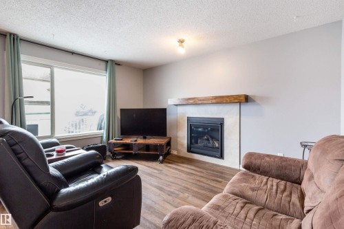 20515 92 Avenue, Edmonton, AB - Indoor Photo Showing Living Room With Fireplace