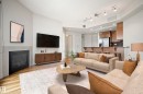 401 11933 Jasper Avenue, Edmonton, AB  - Indoor Photo Showing Living Room With Fireplace 