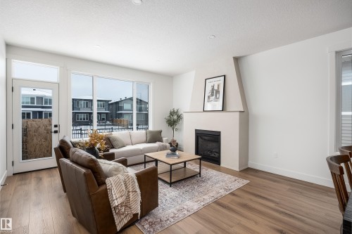 7 Sydwyck Circle, Spruce Grove, AB - Indoor Photo Showing Living Room With Fireplace