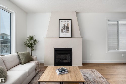 7 Sydwyck Circle, Spruce Grove, AB - Indoor Photo Showing Living Room With Fireplace