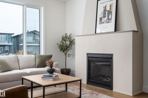 7 Sydwyck Circle, Spruce Grove, AB - Indoor Photo Showing Living Room With Fireplace