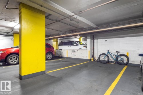 Underground, Heated Parking - 1207 12303 Jasper Avenue, Edmonton, AB - Indoor Photo Showing Garage