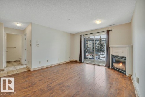 242 16311 95 Street, Edmonton, AB - Indoor With Fireplace