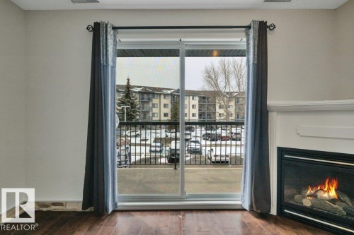 242 16311 95 Street, Edmonton, AB - Indoor With Fireplace