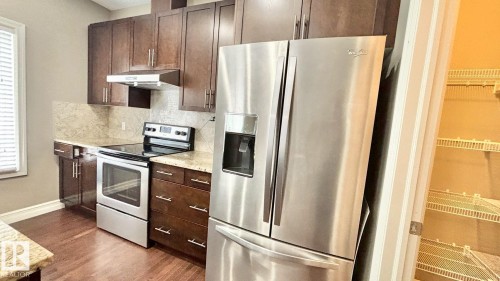 16 2003 Rabbit Hill Road Nw, Edmonton, AB - Indoor Photo Showing Kitchen With Stainless Steel Kitchen With Upgraded Kitchen