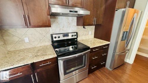 16 2003 Rabbit Hill Road Nw, Edmonton, AB - Indoor Photo Showing Kitchen With Stainless Steel Kitchen