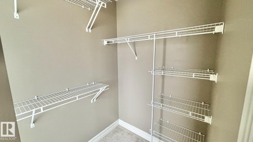 16 2003 Rabbit Hill Road Nw, Edmonton, AB - Indoor With Storage