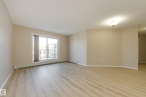 404 6070 Schonsee Way, Edmonton, AB - Indoor Photo Showing Other Room