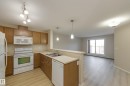 404 6070 Schonsee Way, Edmonton, AB  - Indoor Photo Showing Kitchen With Double Sink 