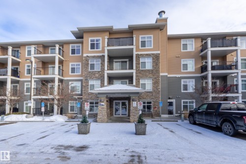 404 6070 Schonsee Way, Edmonton, AB - Outdoor With Balcony With Facade