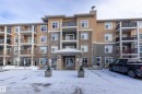 404 6070 Schonsee Way, Edmonton, AB  - Outdoor With Balcony With Facade 