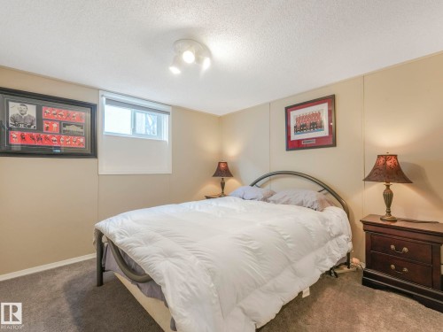 7653 91 Avenue, Edmonton, AB - Indoor Photo Showing Bedroom