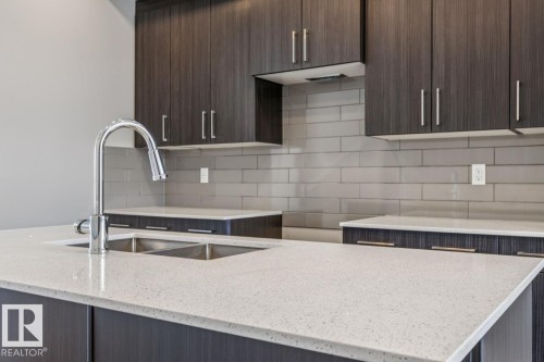 306 Hawthorn Way, Leduc, AB - Indoor Photo Showing Kitchen With Double Sink With Upgraded Kitchen