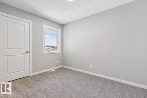 306 Hawthorn Way, Leduc, AB - Indoor Photo Showing Other Room