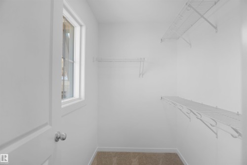 54 525 Secord Boulevard, Edmonton, AB - Indoor With Storage