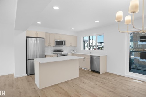 54 525 Secord Boulevard, Edmonton, AB - Indoor Photo Showing Kitchen With Upgraded Kitchen