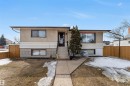 The property features an exterior with stucco and horizontal siding, a fenced yard, and a front walkway leading to the main entrance - 12908 126 Street, Edmonton, AB  - Outdoor 