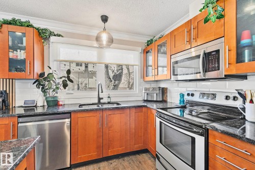 7720 158 Street, Edmonton, AB - Indoor Photo Showing Kitchen With Double Sink