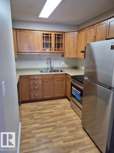 402 9323 105 Ave, Edmonton, AB - Indoor Photo Showing Kitchen With Double Sink