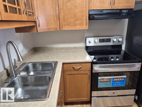 402 9323 105 Ave, Edmonton, AB - Indoor Photo Showing Kitchen With Double Sink