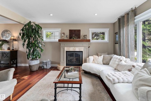 10765 65 Street, Edmonton, AB - Indoor Photo Showing Living Room With Fireplace