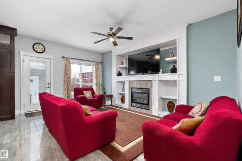 598 Tamarack Road, Edmonton, AB - Indoor Photo Showing Living Room With Fireplace