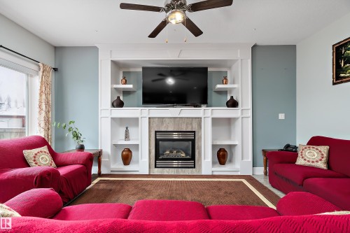 598 Tamarack Road, Edmonton, AB - Indoor Photo Showing Living Room With Fireplace