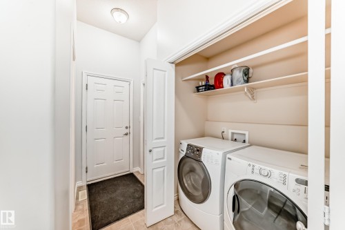 6003 48 Avenue, Beaumont, AB - Indoor Photo Showing Laundry Room