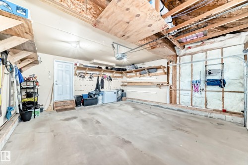 6003 48 Avenue, Beaumont, AB - Indoor Photo Showing Garage