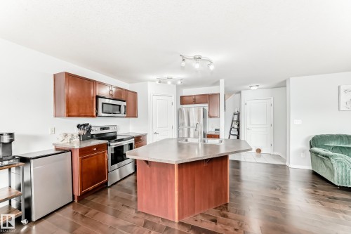 6003 48 Avenue, Beaumont, AB - Indoor Photo Showing Kitchen With Stainless Steel Kitchen With Double Sink