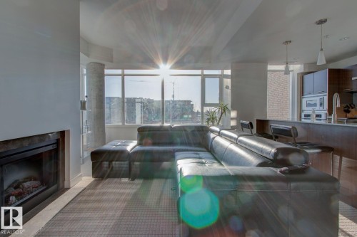 313 2510 109 Street, Edmonton, AB - Indoor Photo Showing Living Room With Fireplace