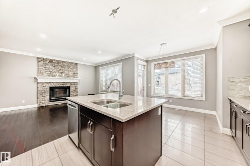 17931 78 Street, Edmonton, AB - Indoor Photo Showing Kitchen With Fireplace With Double Sink