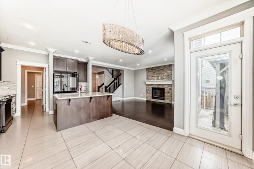 17931 78 Street, Edmonton, AB - Indoor Photo Showing Kitchen With Fireplace