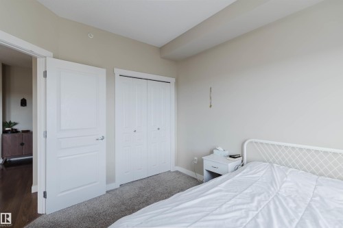 This room features light-colored walls and a neutral-toned carpet - 402 3670 139 Avenue, Edmonton, AB - Indoor Photo Showing Bedroom