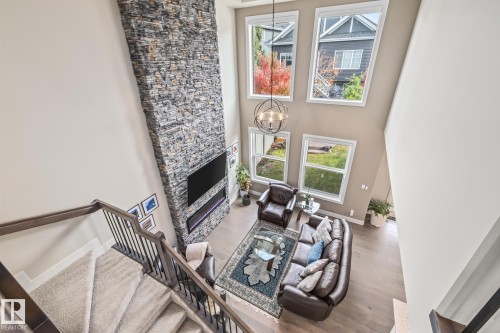 1759 Tanager Close, Edmonton, AB - Indoor Photo Showing Other Room With Fireplace