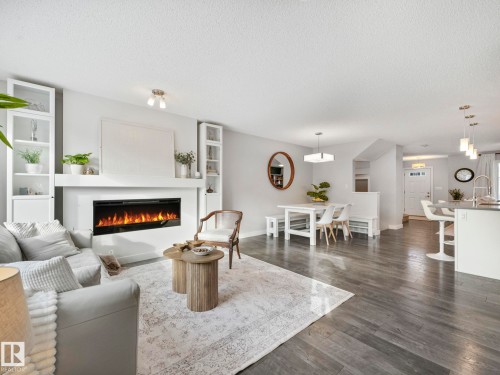 2604 Coughlan Road, Edmonton, AB - Indoor Photo Showing Living Room With Fireplace
