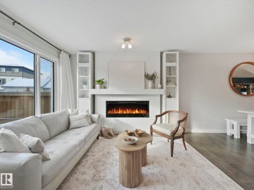 2604 Coughlan Road, Edmonton, AB - Indoor Photo Showing Living Room With Fireplace