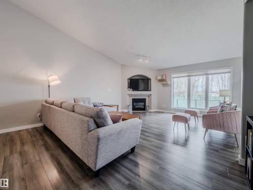 18 64 Blackburn, Edmonton, AB - Indoor Photo Showing Living Room With Fireplace