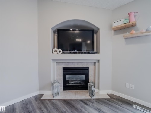 18 64 Blackburn, Edmonton, AB - Indoor Photo Showing Living Room With Fireplace