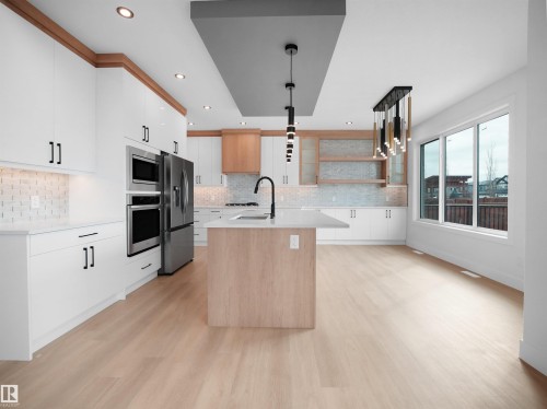 165 Edgewater Circle, Leduc, AB - Indoor Photo Showing Kitchen With Upgraded Kitchen