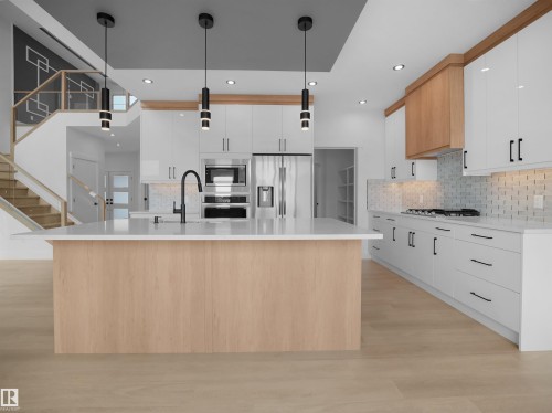 165 Edgewater Circle, Leduc, AB - Indoor Photo Showing Kitchen With Upgraded Kitchen
