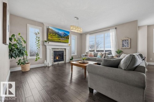 3128 58 Avenue, Rural Leduc County, AB - Indoor Photo Showing Living Room With Fireplace