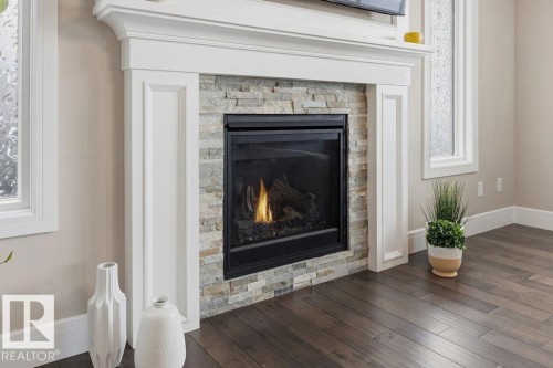 3128 58 Avenue, Rural Leduc County, AB - Indoor Photo Showing Living Room With Fireplace