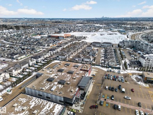 Aerial view showcasing the surrounding residential area and commercial buildings - 20650 94A Avenue, Edmonton, AB - Outdoor With View
