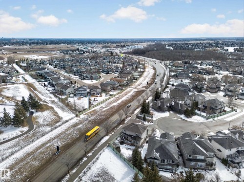 Aerial view showcasing the neighborhood, featuring numerous residential properties and a visible roadway - 20650 94A Avenue, Edmonton, AB - Outdoor With View