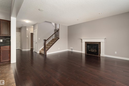 149 Sutton Close, Sherwood Park, AB - Indoor Photo Showing Living Room With Fireplace