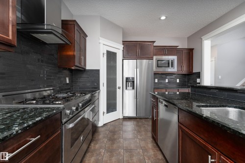 149 Sutton Close, Sherwood Park, AB - Indoor Photo Showing Kitchen With Stainless Steel Kitchen With Upgraded Kitchen